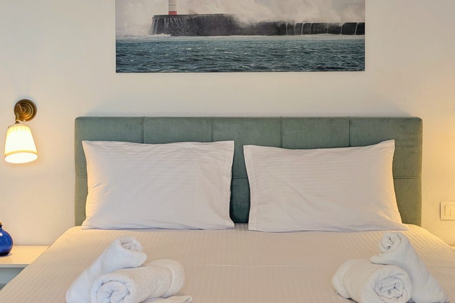 The bed of the front bedroom apartment